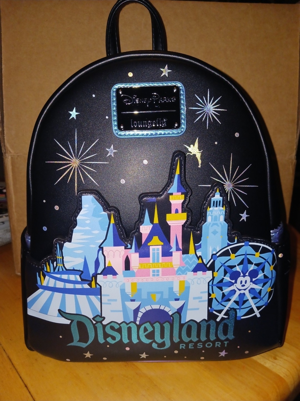 Loungefly Black Disneyland Resort Castle Mini Backpack with Pastel Artwork